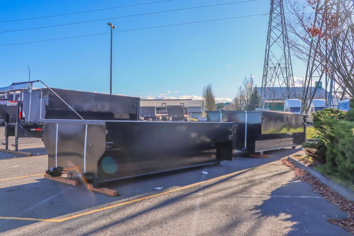 Roll-off dumpster ready for waste disposal at job site for Residential Dumpster Rental in East Hampton